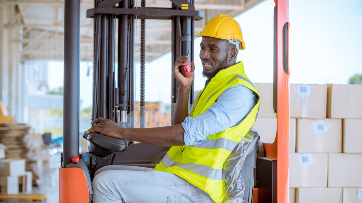 Man driving forklift