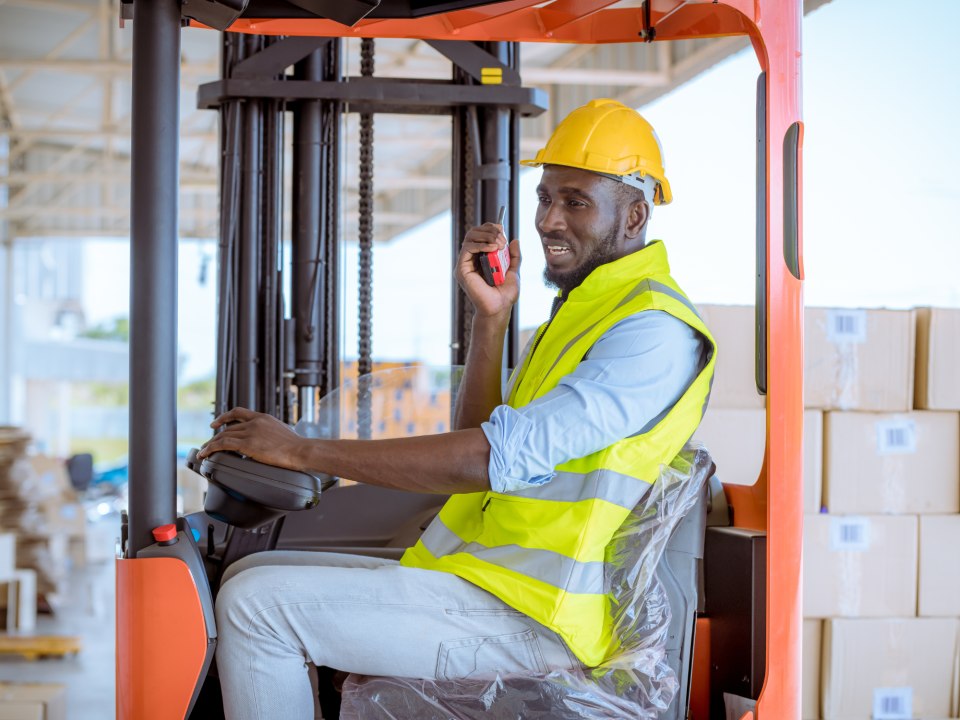 Man driving forklift